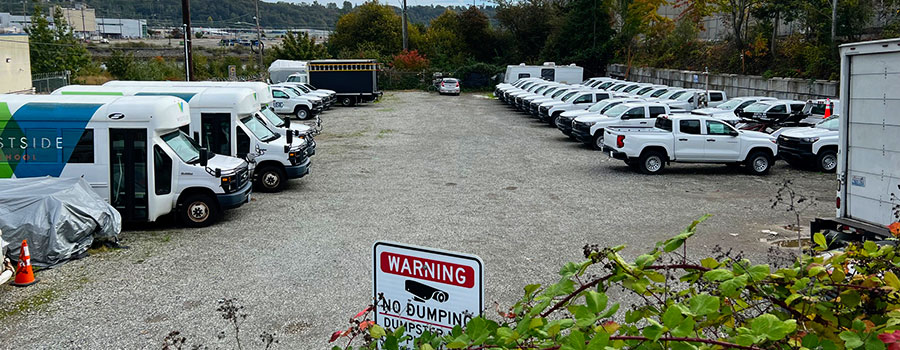 Rows of trucks parked in the South Park outdoor storage lot